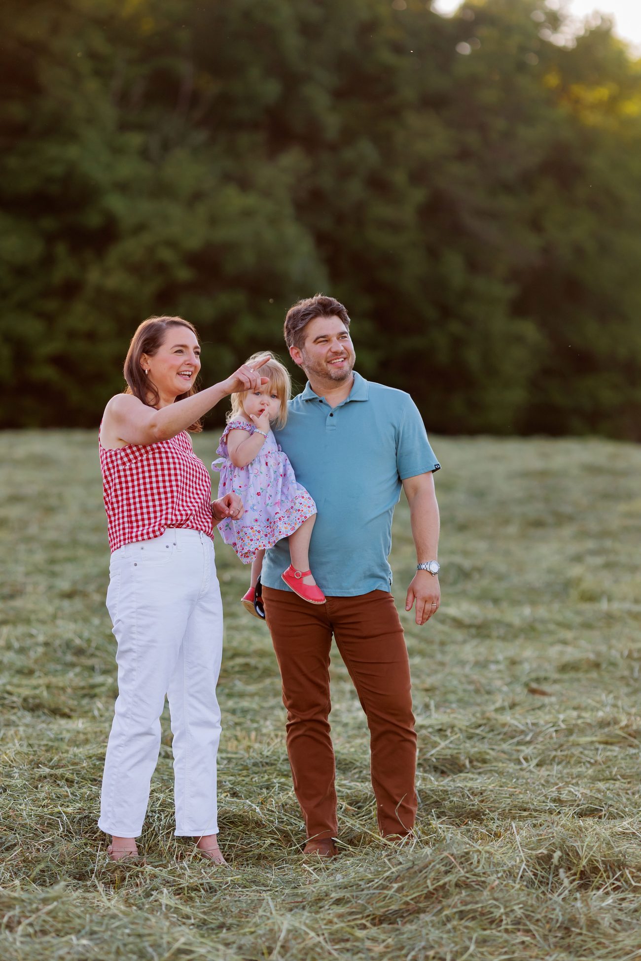 Ellen Paul with her family in a field at golden hour